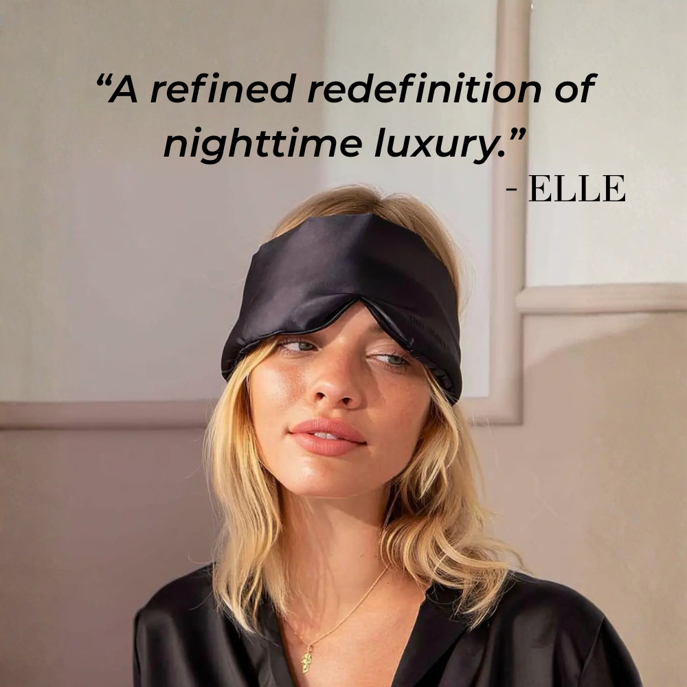 Woman wearing GLOWE Deep Sleep Mask in Midnight Black, lifestyle editorial shot