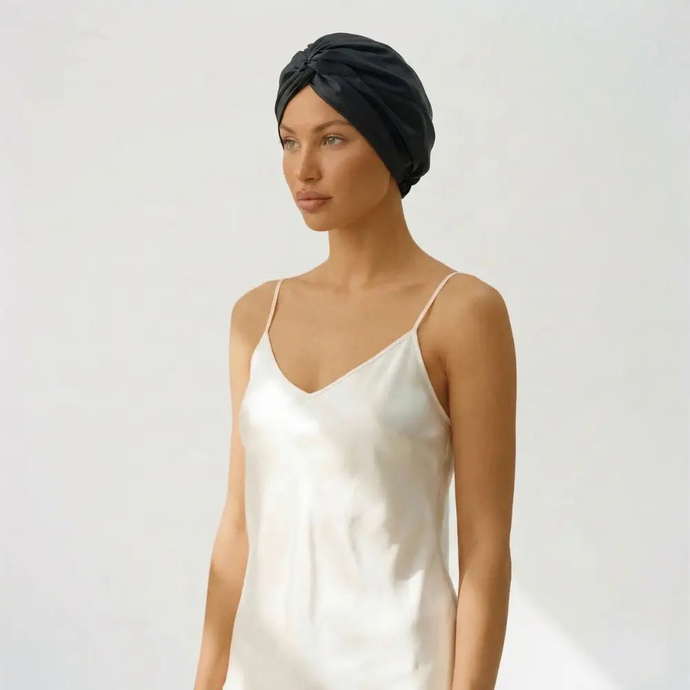 Black silk bonnet on a model