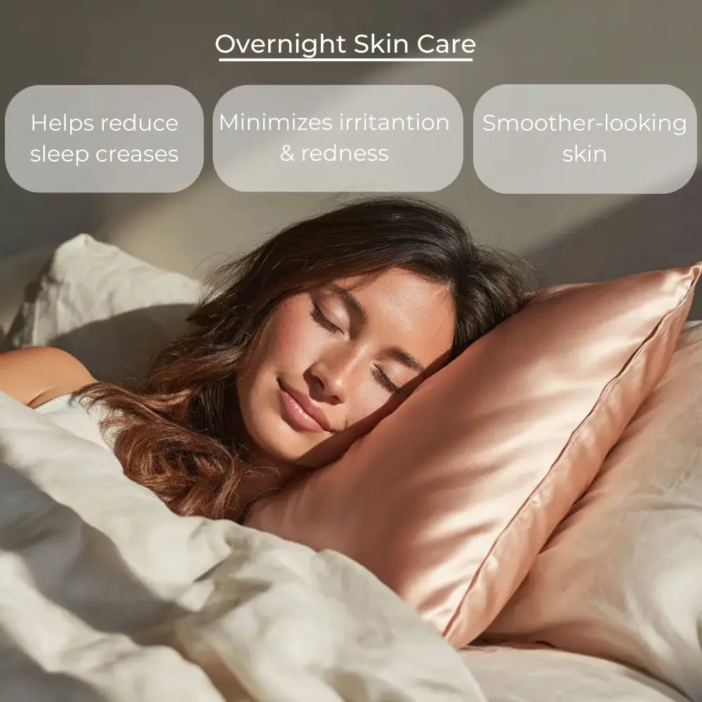 Woman sleeping on GLOWE Silk Pillowcase in Soft Blush, overnight skin care benefits including reduced sleep creases and smoother skin