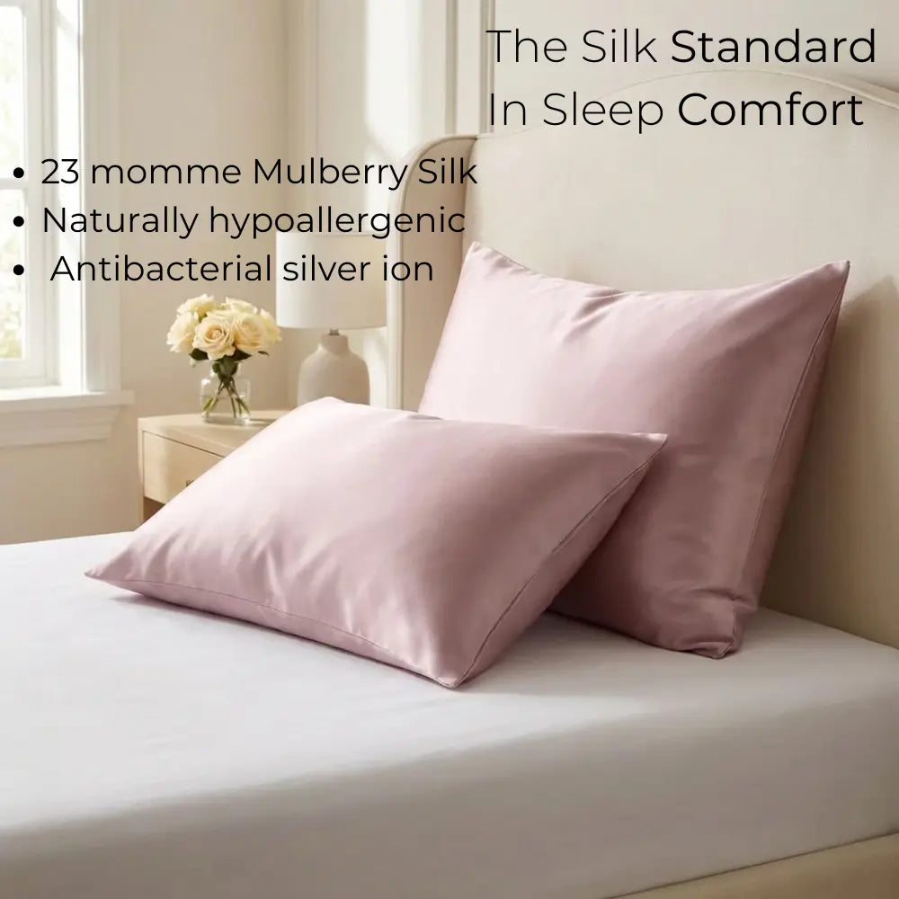 GLOWE Silk Pillowcases in Dusty Rose on bed, 23 momme mulberry silk, hypoallergenic, antibacterial silver ion